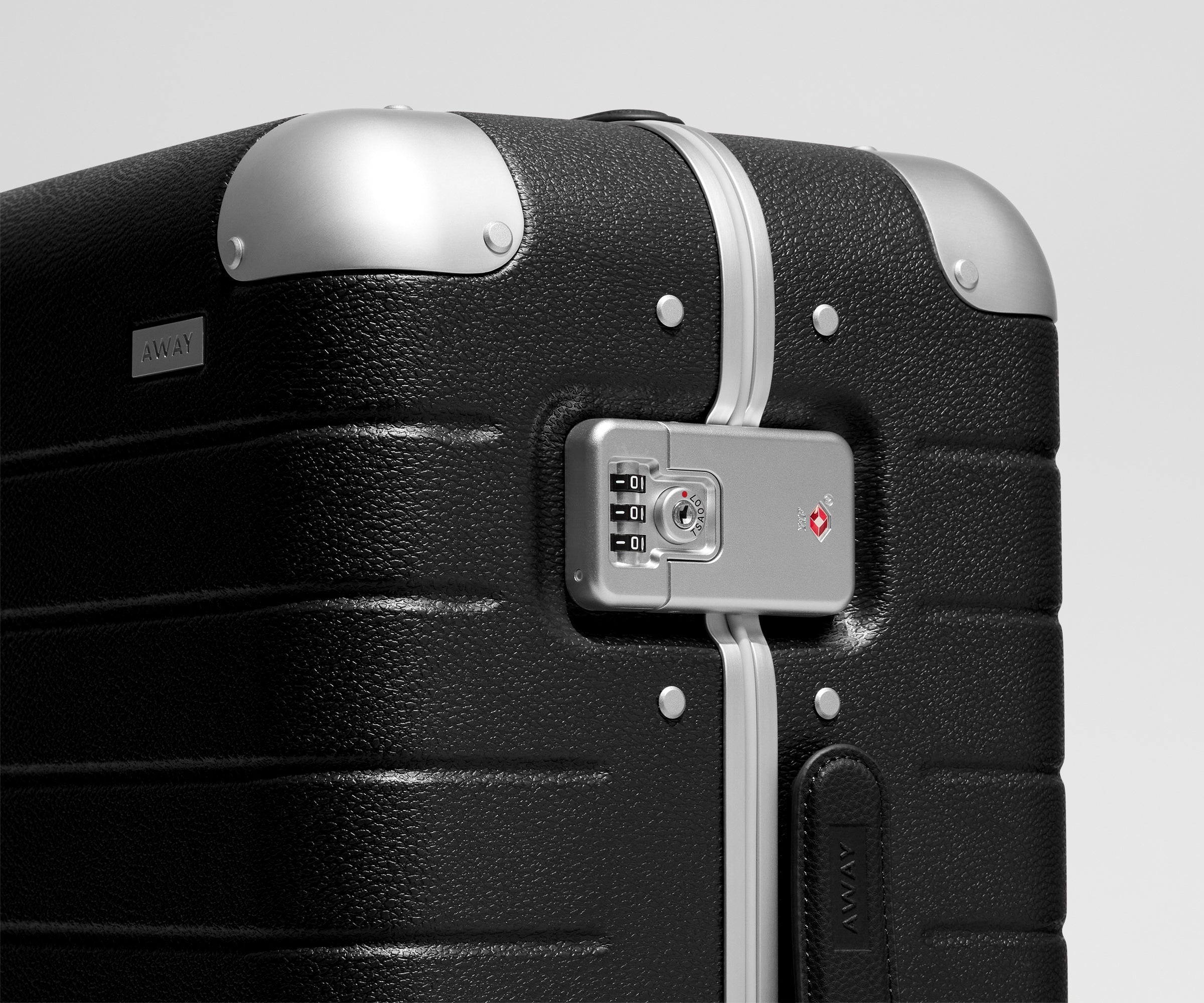 Away The Aluminum Edge Bigger Carry-On Suitcase - Jet Black