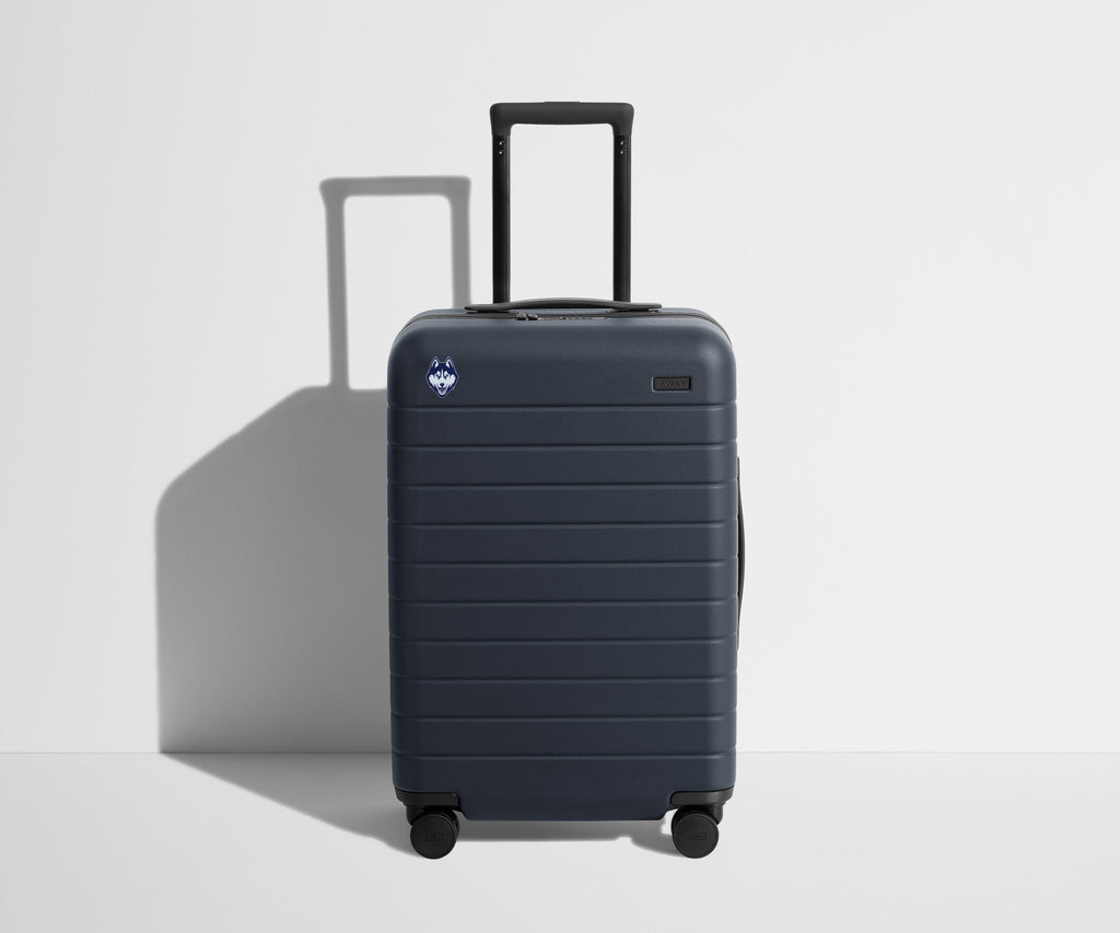 Away The Collegiate Bigger Carry-On Suitcase - UConn ®