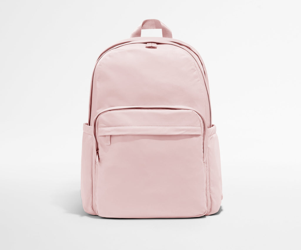 Away Large Featherlight Backpack in Blush Pink