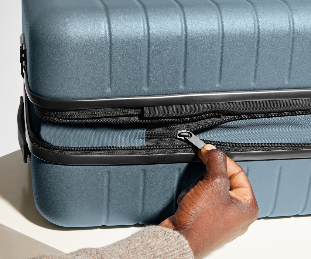 Away The Carry-On Flex Suitcase - Coast Blue