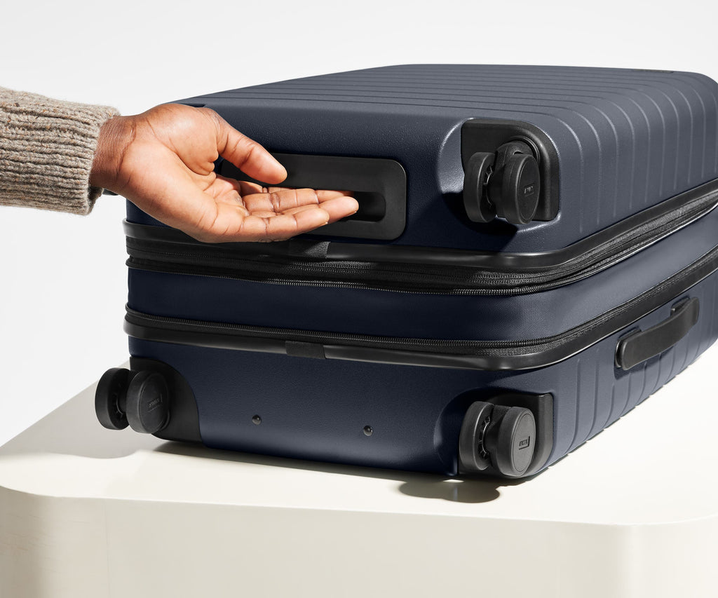 Away The Bigger Carry-On Flex Suitcase - Navy Blue