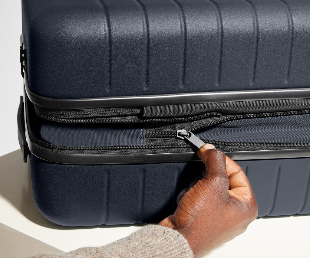 Away The Bigger Carry-On Flex Suitcase - Navy Blue